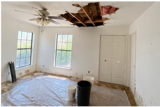 Emergency ceiling water damage restoration & mitigation in Kyle, TX — collapsed drywall from upstairs pipe burst requiring 24/7 water damage cleanup